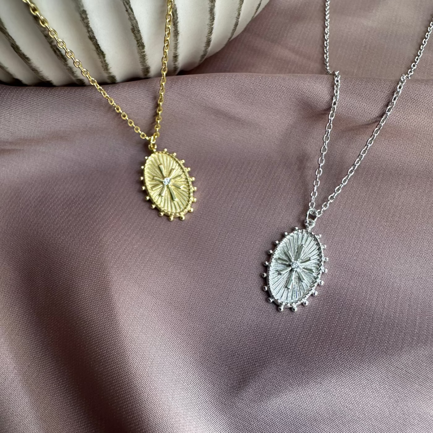 Oval Wheel Token Pendant